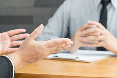 Attorney talking to his client